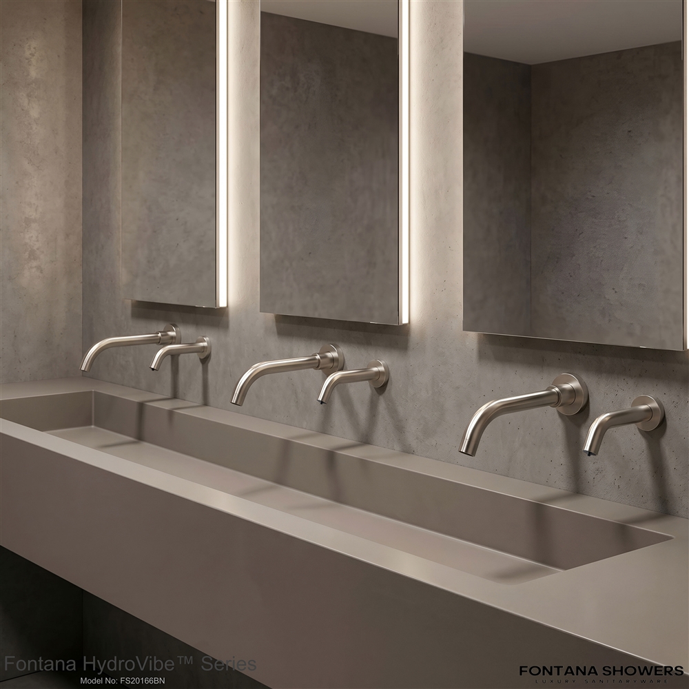 ADA touchless faucet system in a modern commercial restroom